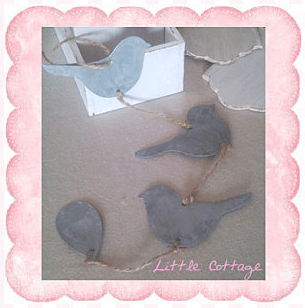 Guirlande d'oiseux zinc "We are in the Garden"